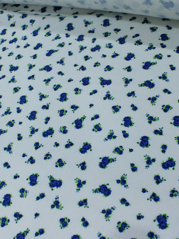 Tecido Sarja Mista com Elastano Micro Rosas Azul e Branco