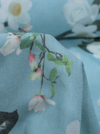 Tecido Sarja Mista Com Elastano Flores brancas e Azul Claro