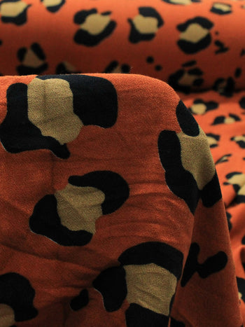 Tecido Crepe de Viscose Barrado Correntes e Animal Print Laranja