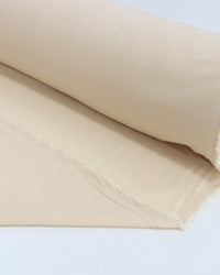 Tecido Crepe Texturizado com Elastano Bege Claro