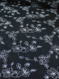 Tecido Alfaiataria de Viscose Bordada Floral Branco e Preto