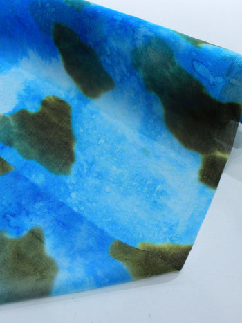 Tecido Crepe Chiffon Italiano Fundo do Mar Azul e Tons Terrosos
