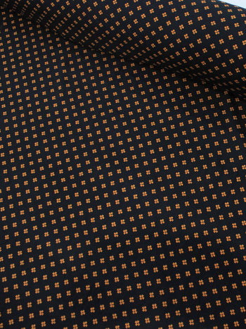 Tecido Viscose Micro Trevo Preto Laranja