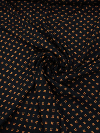 Tecido Viscose Micro Trevo Preto Laranja