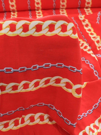 Tecido Viscose Correntes Vermelho e Dourado