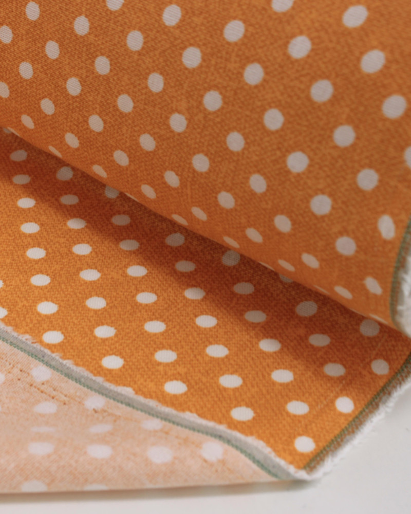 Tecido Linho Misto Estampado Micro Poá Branco e Tons de Laranja