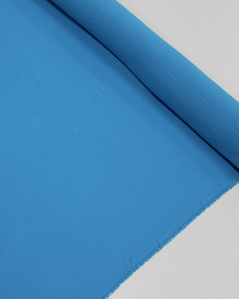 Tecido Crepe Duna Azul Claro