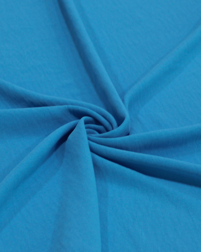 Tecido Crepe Duna Azul Claro