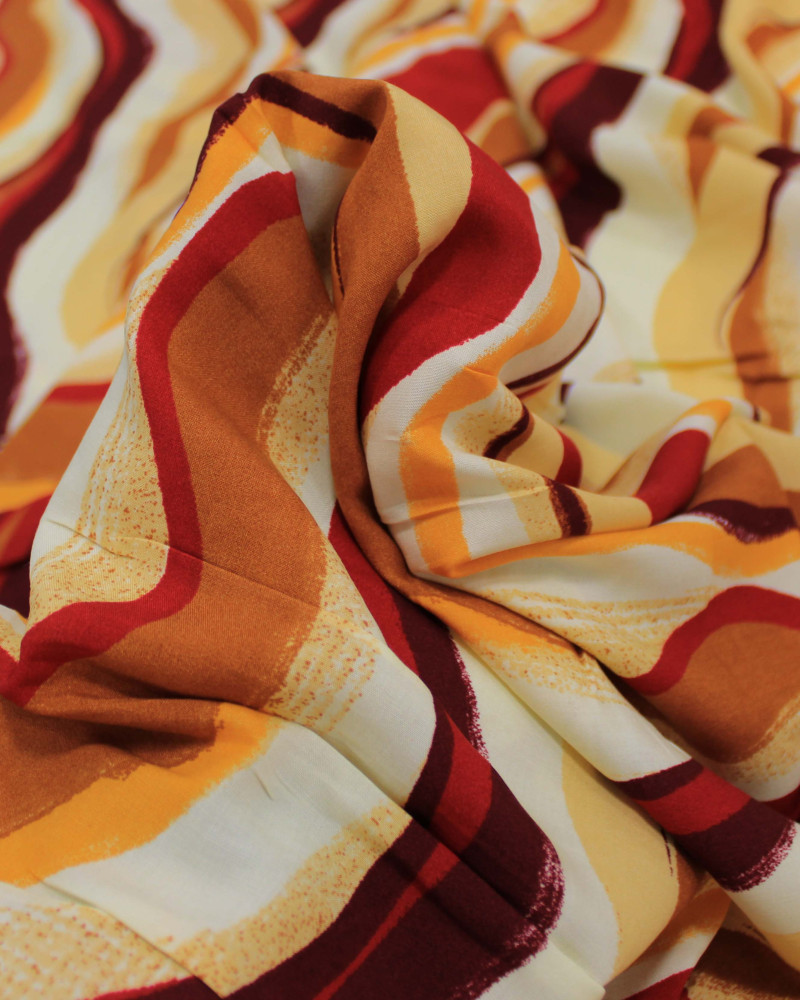 Tecido Viscose Listras Ondulares Vermelho e Tons Terrosos