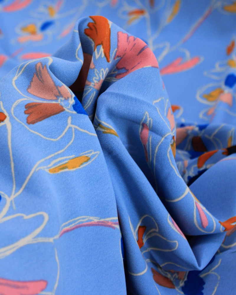 Tecido Crepe Koshibo Flores Abstratas Colorido e Azul Bebê
