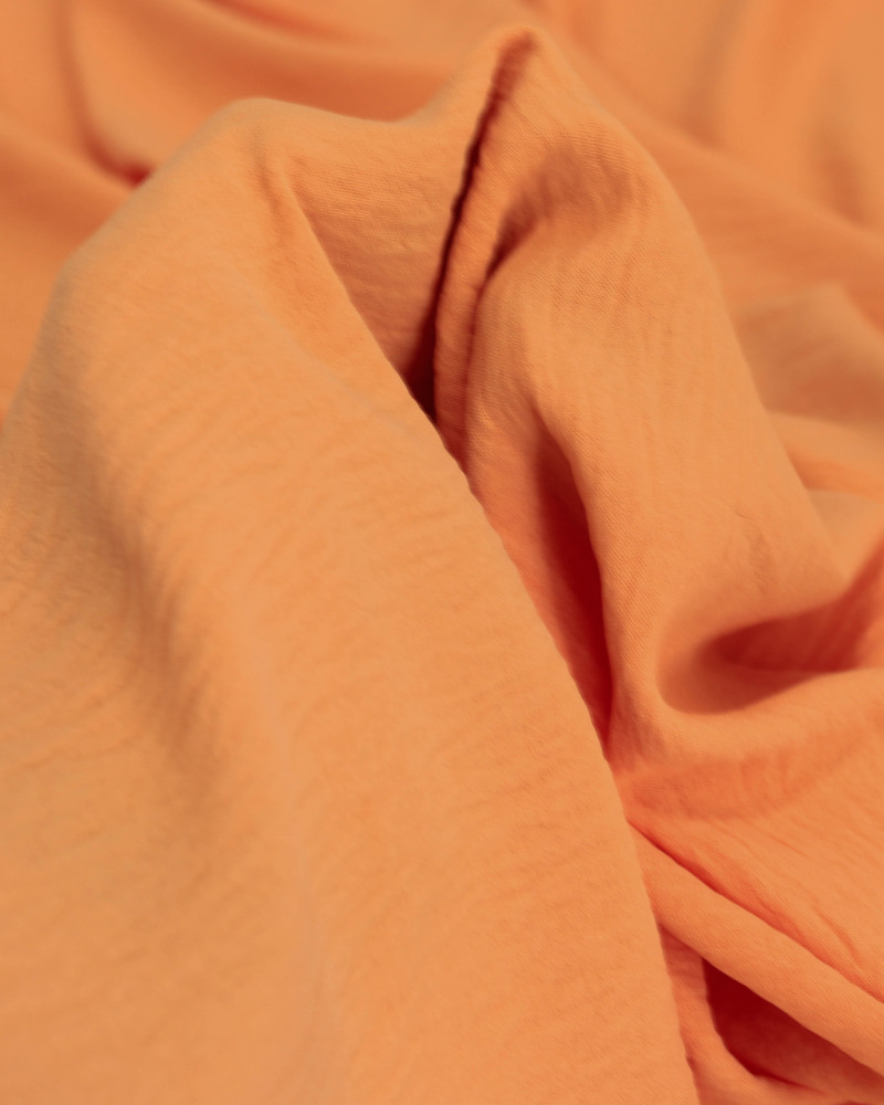 Tecido Crepe Duna Laranja Claro