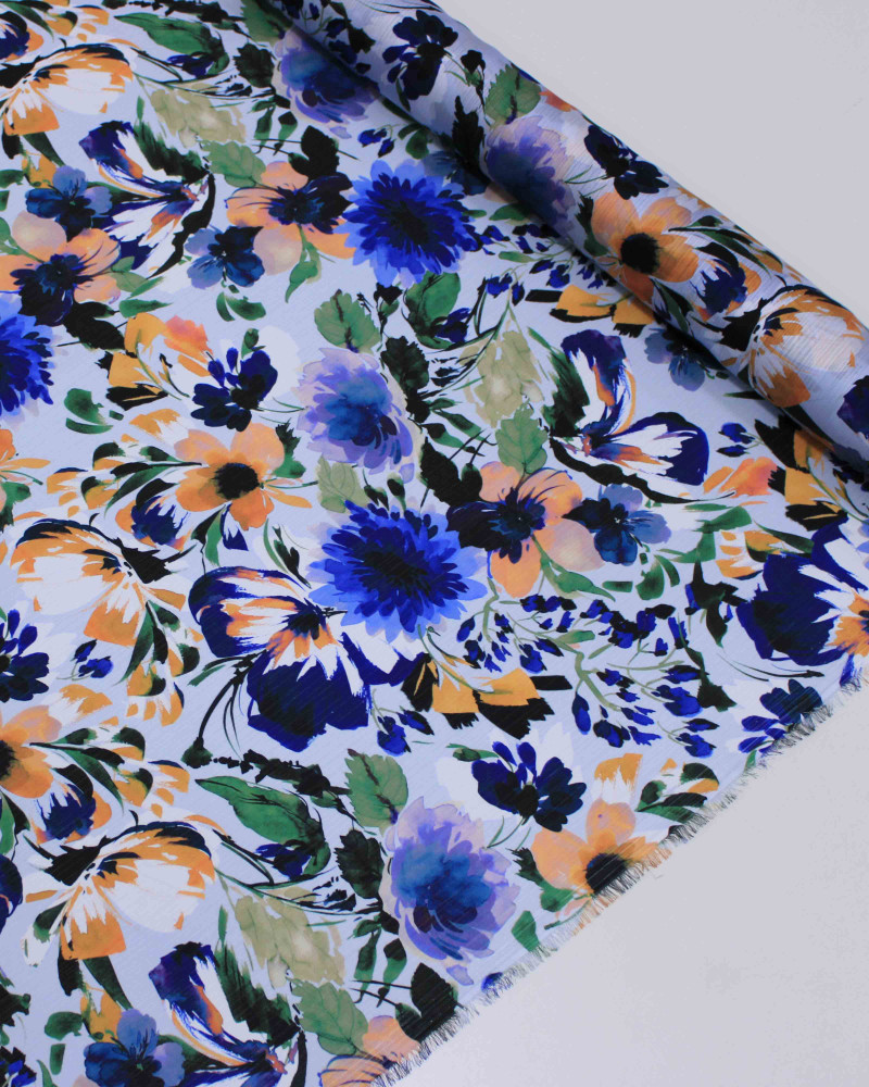 Tecido Crepe Chiffon Texturizado Italiano Tapete Floral Colorido e Tons de Azul