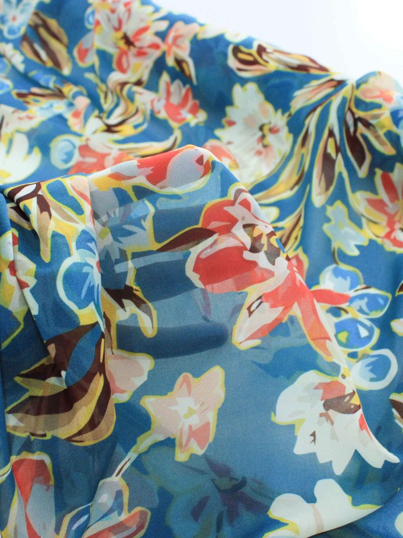 Tecido Crepe Chiffon Italiano Flores Coloridas e Azul Petróleo
