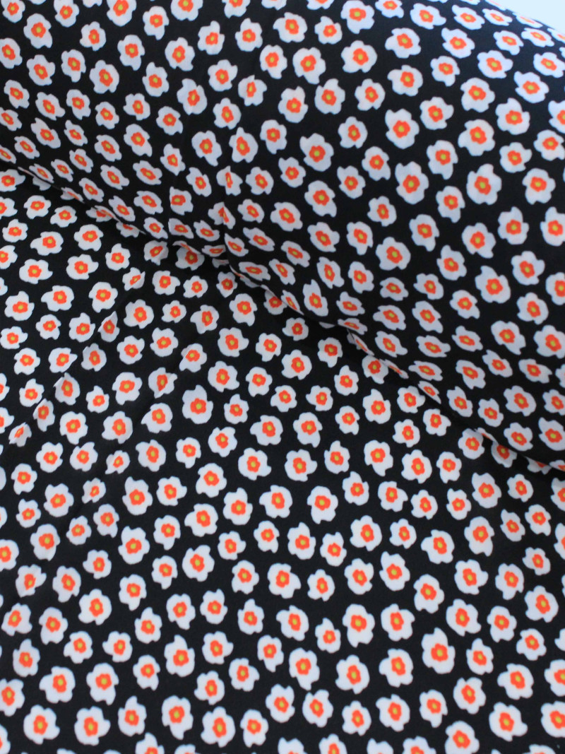 Tecido Crepe GGT Micro Floral Preto e Laranja