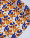 Tecido Viscose Texturizada Folhagem Abstrata Laranja, Azul e Branco