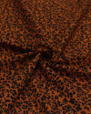 Tecido Viscose Micro Pétalas Preto e Ferrugem