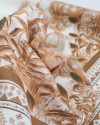 Tecido Linho Puro Italiano Barrado Folhagens Tropicais Terracota e Offwhite