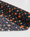 Tecido Crepe Koshibo Leve Italiano Campo de Flores Laranja e Preto