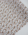 Tecido Viscose Texturizada Tapete Floral Branco e Nude