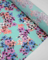 Tecido Cambraia com Elastano Tapete Floral Colorido e Verde Água