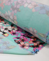 Tecido Cambraia com Elastano Tapete Floral Colorido e Verde Água