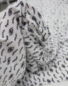 Tecido Viscose Texturizada Estampa de Olhos P/B