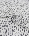 Tecido Viscose Texturizada Estampa de Olhos P/B