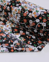 Tecido Viscose Mista com Poliamida Grosso Tapete Floral Tons Quentes, Preto e Branco