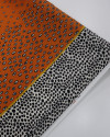 Tecido Crepe GGT Barrado Animal Print Branco e Laranja