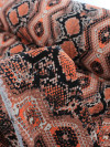 Tecido Crepe Bubble Étnico Coral e Preto