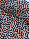 Tecido Crepe GGT Micro Floral Preto e Laranja
