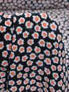 Tecido Crepe GGT Micro Floral Preto e Laranja